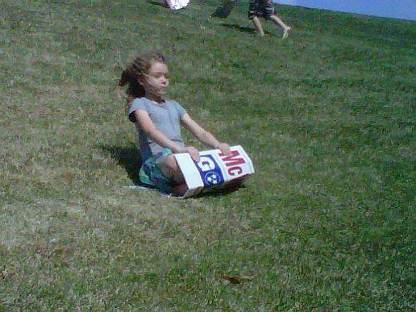 Genevieve grass sledding at rocknromp
