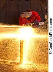 Multiple exposure of welder making sparks multiple exposure of welder in workshop manufacturin
