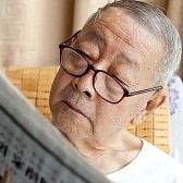 8141952-a-senior-man-is-reading-newspaper-intently.jpg