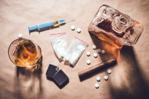 pile-of-drugs-and-alcohol-300x200.jpg